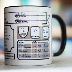 May include: White ceramic mug with a black handle. The mug has a character sheet design with the text "Lawful Evil", "Alignment", "Luna C.", "Player Name", "12 Armor Class", "+2 Initiative", "30 feet Speed", "Debate/Argument +5 9d6+7 Psychic", "Mockery +5 4d6+5 Psychic", and "Mood Swings +5 3d4+3 Psychic".