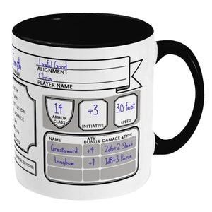 May include: White ceramic mug with a black rim and handle. The mug features a character sheet for a role-playing game with the text "Lawful Good" and "Chris" written in blue ink. The character sheet includes stats for armor class, initiative, speed, name, attack bonus, damage, and type.