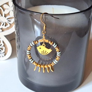Gold steel hoop earrings, bird charm, heishi beads