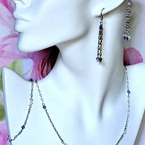 Necklace, bracelet and earrings set in steel and crystal