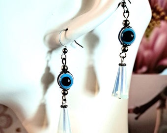 Boucles d'oreilles articulées oeil bleu