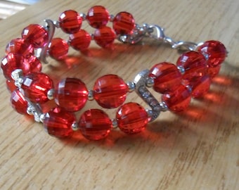 Red bracelet with rhinestones