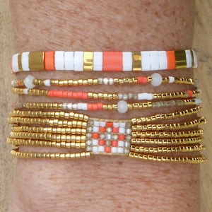 lot of orange and gold bracelets - Miyuki and Tila bead bracelets, gold plated sliding link