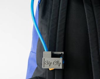 Sip Clip: 3D printed hydration gear. Turn any bag into a hydration pack. Protect & secure your bite valve