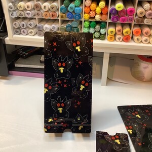 Chibi Mothman cell phone stand