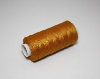 Spoel van draad naaien 350 m oker kleur, draad kleur rood 100% polyester