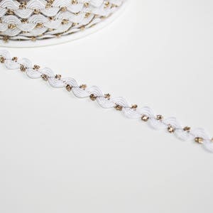 2 m de galon croquet blanc et doré 6 mm