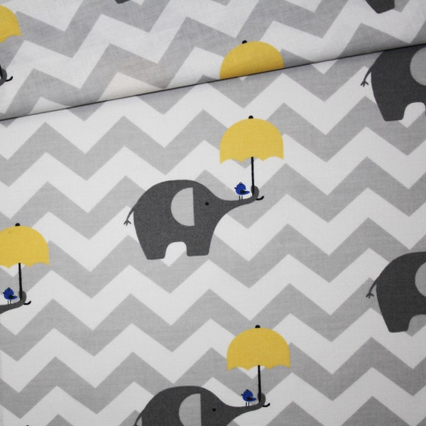 Tissu éléphants gris avec parapluie jaune sur des chevrons gris et blancs en coton imprimé oeko tex