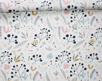 Fabric flowers and leaves in pastel colors on a white background in printed cotton oeko tex