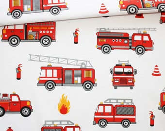 Fire truck fabric on a white background in oeko tex printed cotton