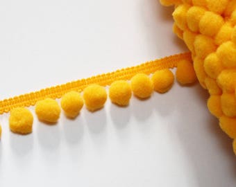 Galon pompons jaune orange 10 mm vendu au mètre