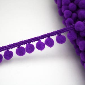 Viola pom pom gal 10 mm venduti per metro