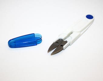 Scissors cut wire with protective, white and blue Cap