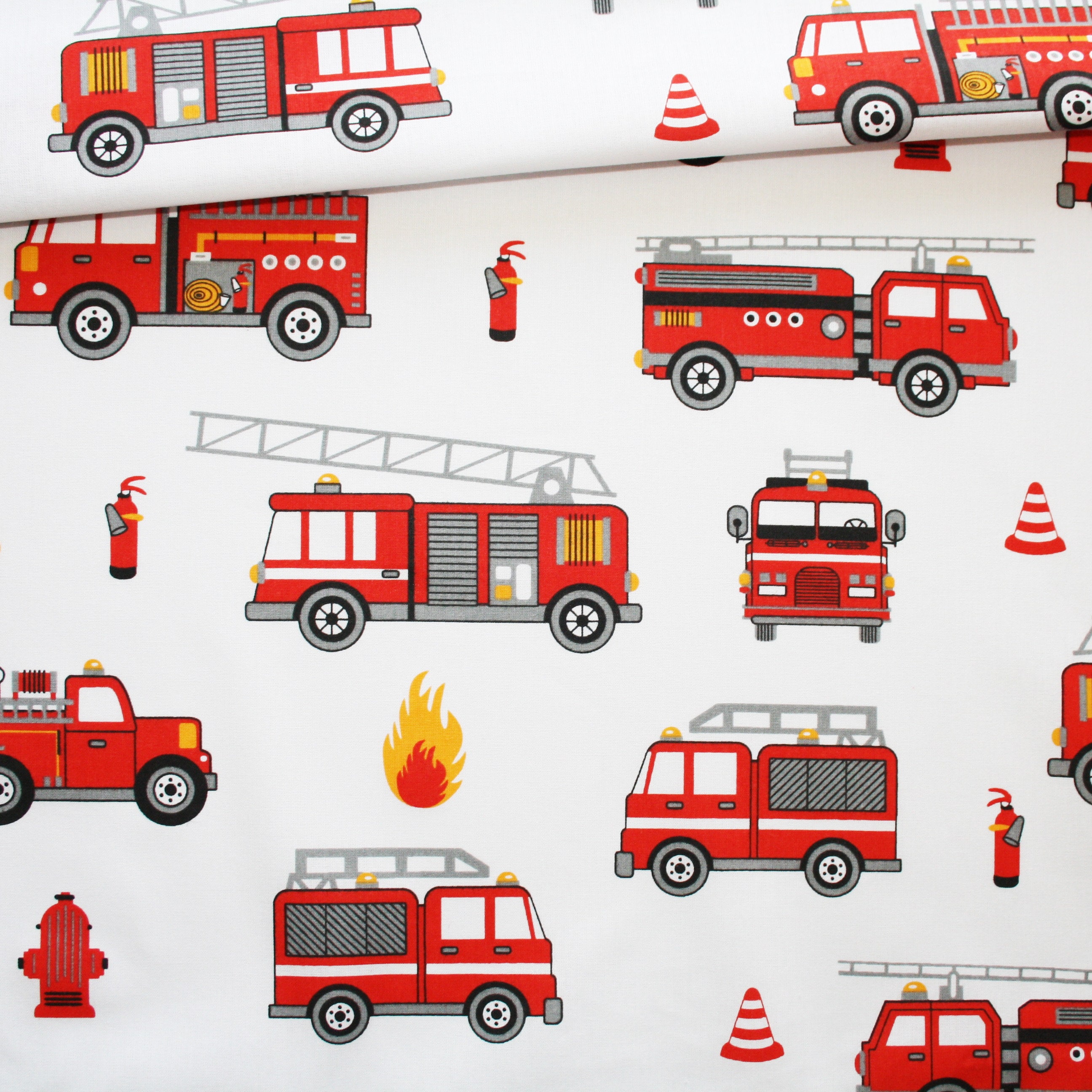Fire truck fabric on a white background in printed cotton oeko tex