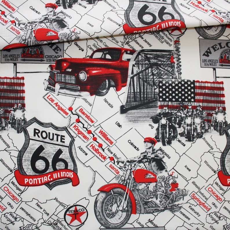 May include: A white fabric with a black and red design featuring a map of the United States with Route 66 highlighted. The map includes cities and states along the route, including Los Angeles, Chicago, Pontiac, Illinois, and Holbrook, Arizona. The design also features a vintage car and a motorcycle.