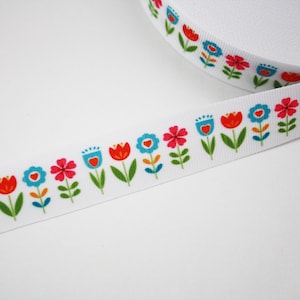 2 m de ruban gros grain 20 mm fleurs colorées sur un fond blanc
