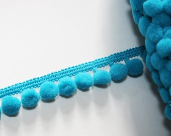 Galon pompons turquoise 10 mm vendu au mètre