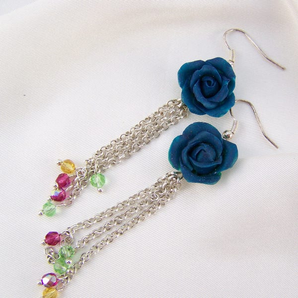 Boucles d'oreilles fleurs turquoise modelées en porcelaine froide