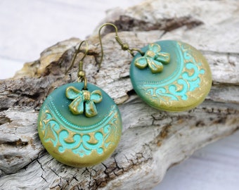 Turquoise earrings modeled in cold porcelain