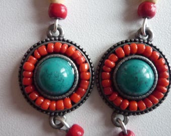 Cabochon-style silver metal earrings in Howlite cab