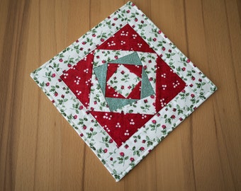 Patchwork blanket, coasters, table decorations