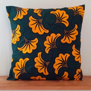 Several dimensions of African style wax cushion cover with wedding flower print