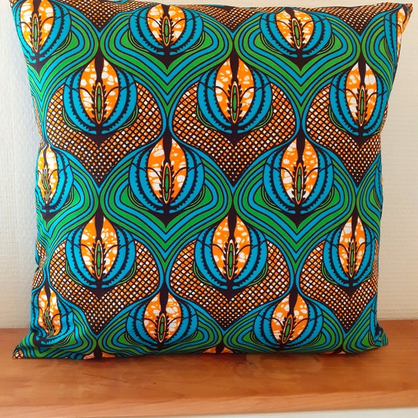 Several dimensions cushion cover in wax African style printed target disc blue and red rosette