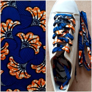 African style wax laces blue and orange wedding flowers