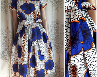 Several lengths, African style dress in wax cotton printed with large flowers, flared for weddings and ceremonies