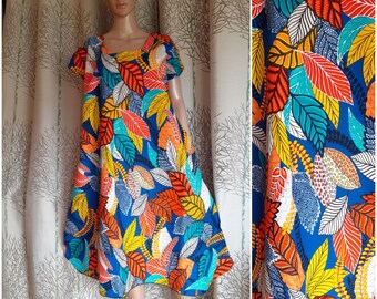 Robe en wax style africain pagne batik boubou forme parapluie évasée circulaire cercle imprimé feuillage feuilles