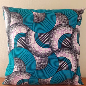 Several dimensions of African style wax cushion cover with graphic print in red, blue, orange and white