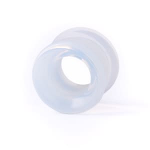 May include: A clear, translucent silicone ear gauge plug. The plug is round with a smooth, polished surface.