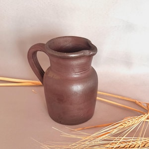 Antique stoneware pitcher, Glazed stoneware jug