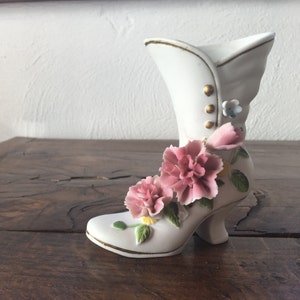 Antique decorative porcelain trinket in the shape of a boot