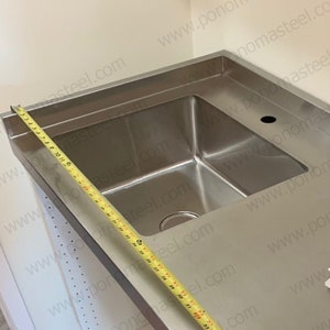 Brushed Stainless Steel Countertop with Integrated Sink & Backsplash