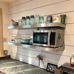 Heavy-duty stainless shelves hold a microwave and kitchenware. Designed for daily use — waterproof, heat-resistant, seamless. Safe for kitchen and pantry storage.
Tags:
microwave shelf, ponoma, stainless, kitchen, heavy duty, wall shelf, floating, steel, modern, durable