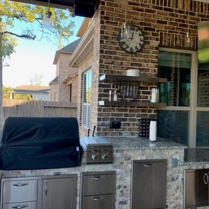 Outdoor floating shelves made from waterproof stainless steel, resistant to heat and weather. Ideal for BBQ zones, patios, and outdoor kitchens.
Tags:
outdoor shelf, bbq shelf, ponoma, waterproof, stainless, steel shelf, patio decor, grill shelf, durable, modern