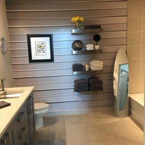 Stainless steel shelves in a bathroom with a soft gray palette. Perfect for towels, candles, and decor. Waterproof, rust-proof, and seamless — ideal for humid spaces.
Tags:
bathroom shelf, towel shelf, waterproof, stainless, ponoma, wall decor, spa shelf, modern bath, floating shelf, durable