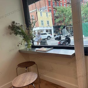 Brushed stainless floating ledge — used as café window bar counter. Rustproof and water resistant.
Tags: cafe shelf, stainless steel ledge, brushed metal shelf, window bar.