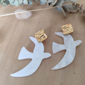 Birds flying earrings