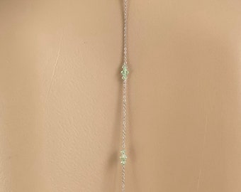 Collier et bijou de dos en acier inoxydable, perles en cristal swarovski vertes claires M46