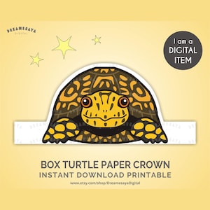 May include: A digital illustration of a box turtle paper crown. The turtle has a yellow and brown shell with a smiling face. The text "I am a DIGITAL ITEM" is in a black circle. The words "BOX TURTLE PAPER CROWN" are below the turtle.