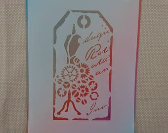 May include: White stencil with a tag shape and a design of gears and a lamp with the text "slaughi. Ros with an inner."