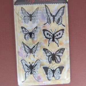 Planche de stickers papillons 3D fond noir et blanc carreaux