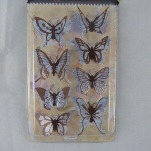 Planche de stickers papillons 3D fond bleu