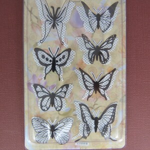 Planche de stickers papillons 3D fond noir et blanc petits pois