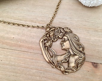 Anastasia Art Nouveau inspired necklace featuring 'Girl holding flowers' stamping