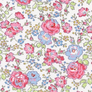 Puede incluir: Un fondo blanco con un patrón repetitivo de flores rosas y azules. Las flores son estilizadas y tienen un aspecto vintage.