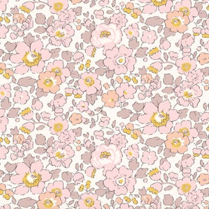 May include: A seamless pattern featuring a delicate floral design with pink, peach, and yellow flowers on a white background. The flowers are surrounded by small leaves and stems in a light brown color.