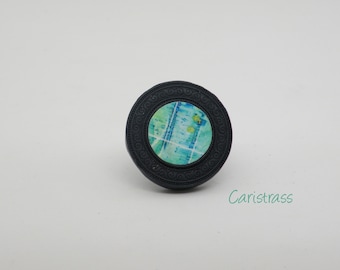 Blue polymer clay ring with green insert